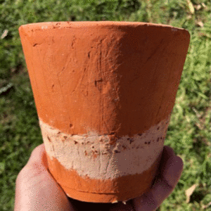 Terracotta pot with burn out